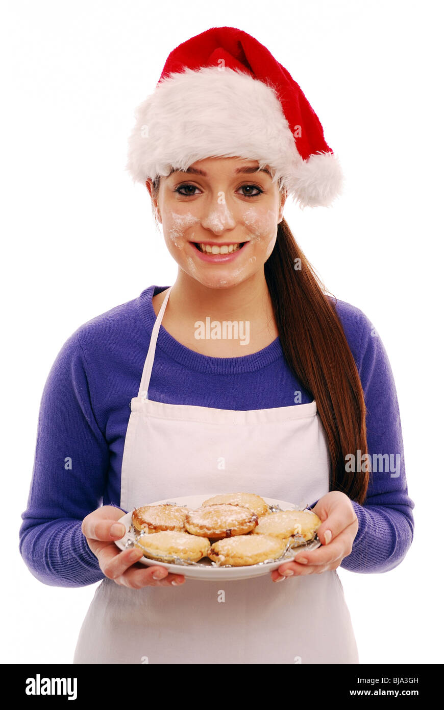 Home cooked mince pies flour on face Stock Photo