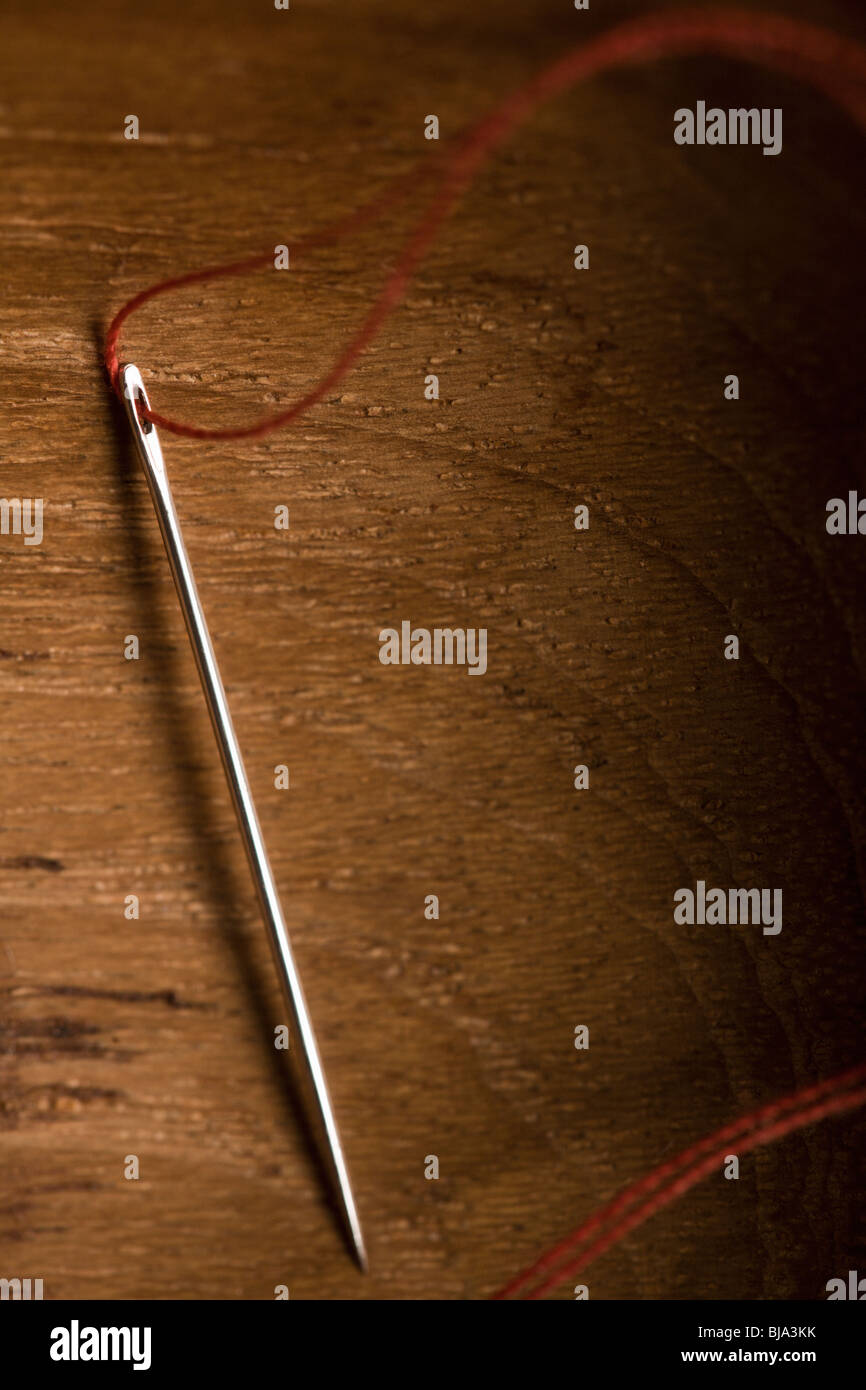 Sewing needle with thread Stock Photo Alamy