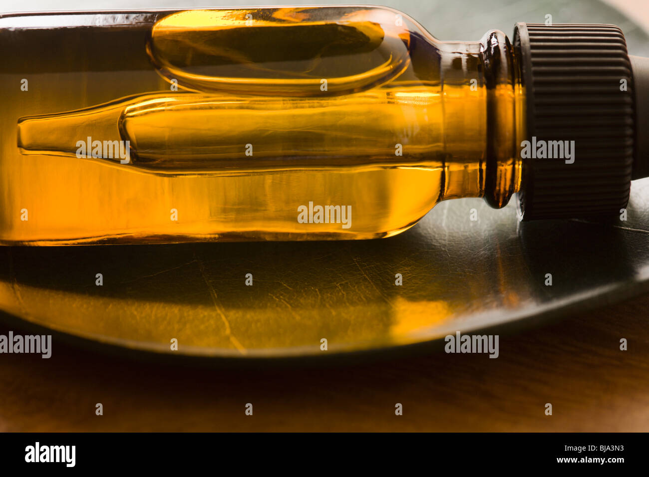 Liquid in medicine dropper bottle Stock Photo Alamy