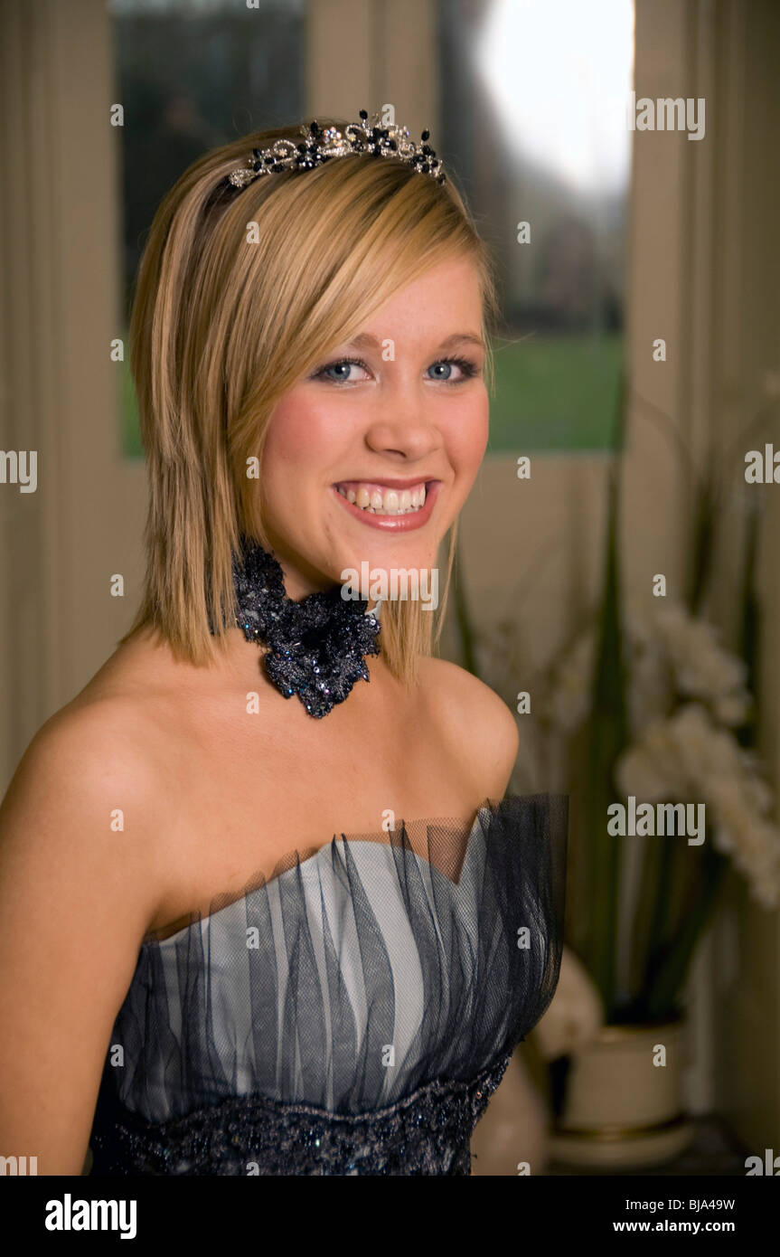 gorgeous blond girl smiling wearing a prom dress Stock Photo - Alamy
