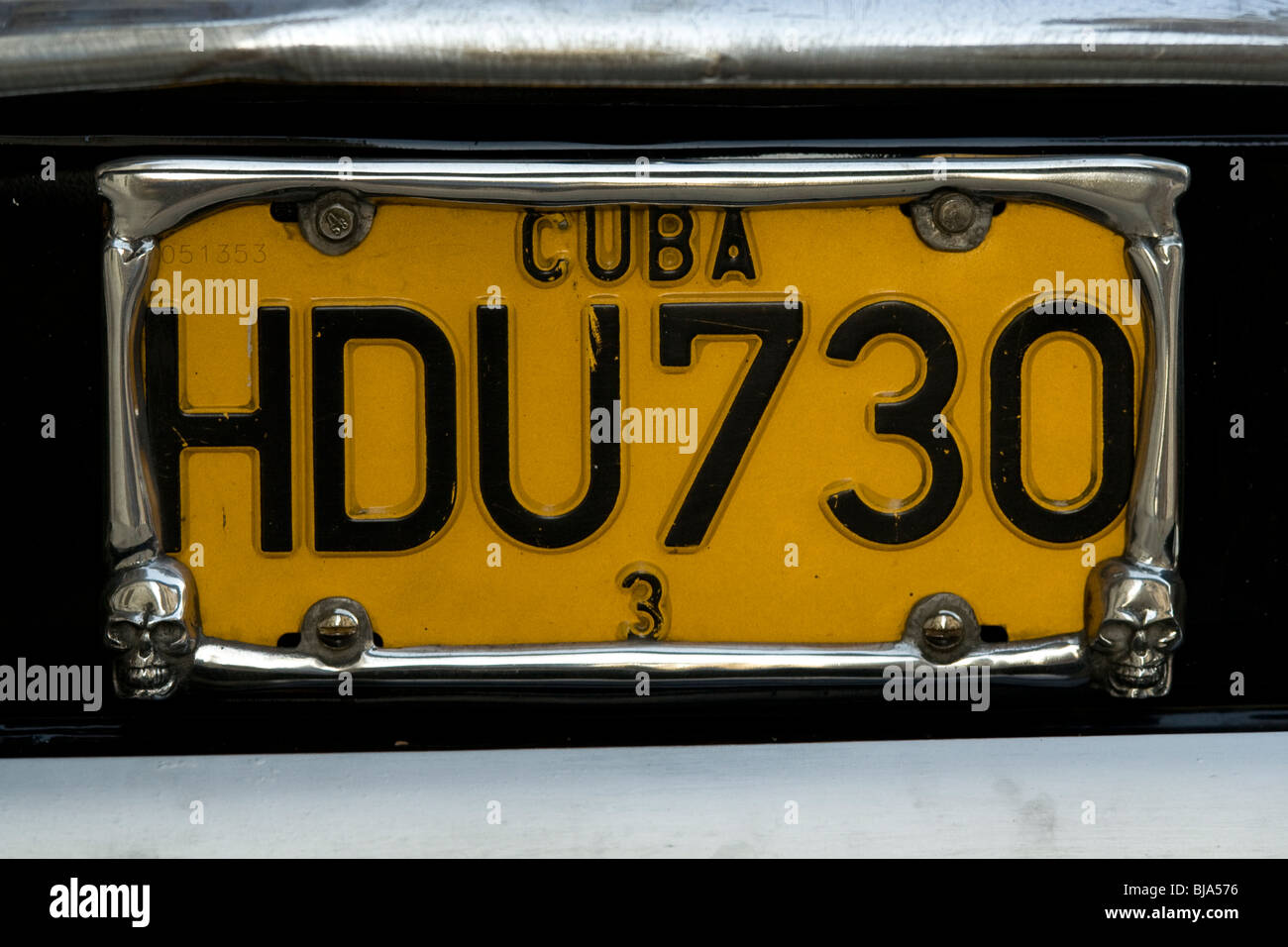 Yellow registration plate of an old American car in Havana, Travel Cuba Caribbean, Centrral America Stock Photo