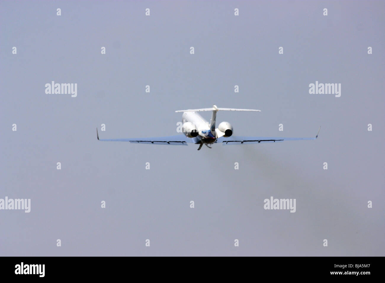 Private Jet,takeoff,aviation,FAA,thrust,engine smoke,jet thrust Stock Photo