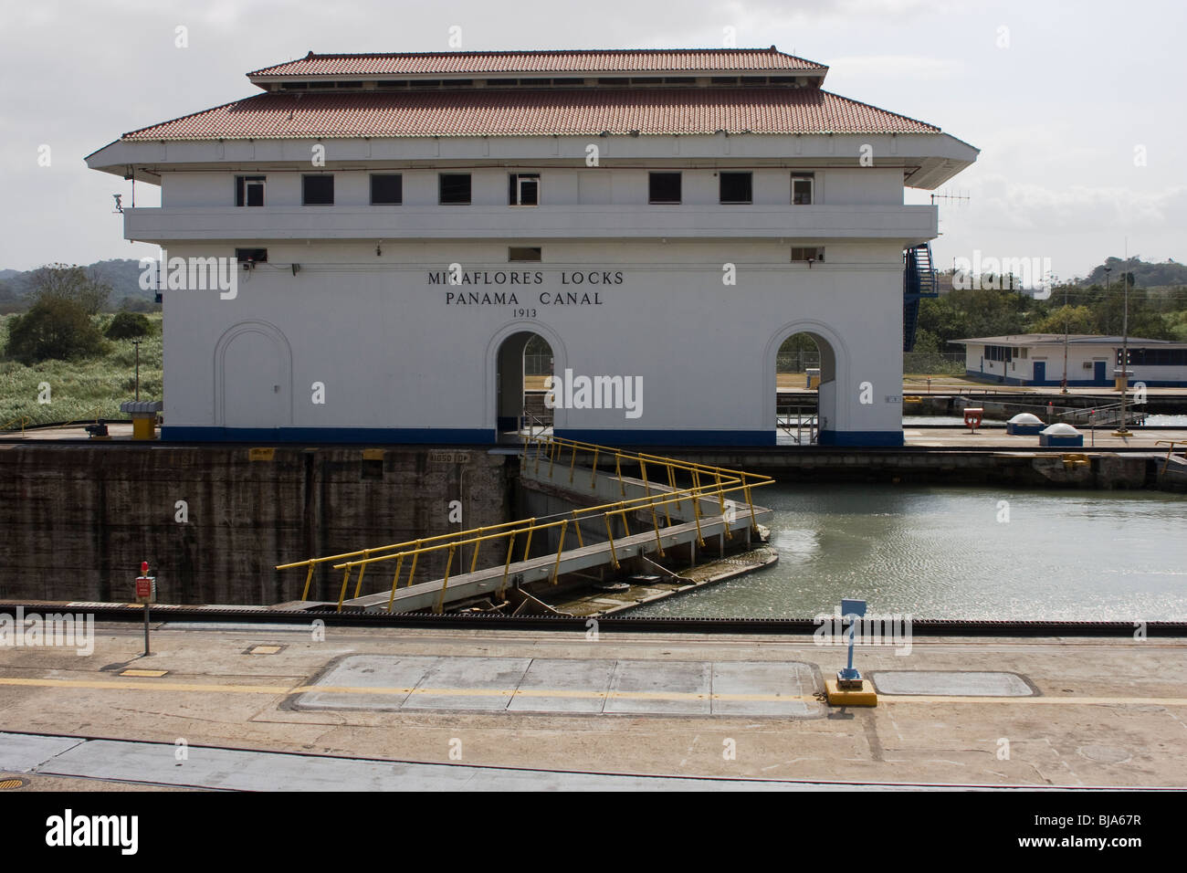 Building at Miraflores locks, Panama canal withe different water levels