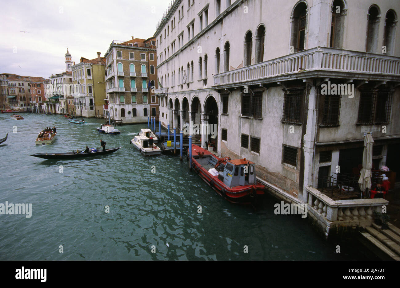 Venice, March 2008 -- Transport boats and Gondola on Canal Grande as ...