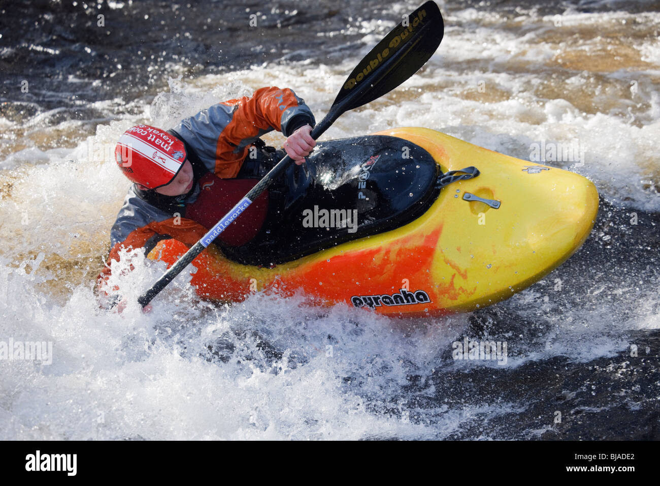 Kayaker kayaking in Pyranah freestyle play kayak in white water on Tryweryn  River. National Whitewater Centre North Wales UK Britain Stock Photo - Alamy