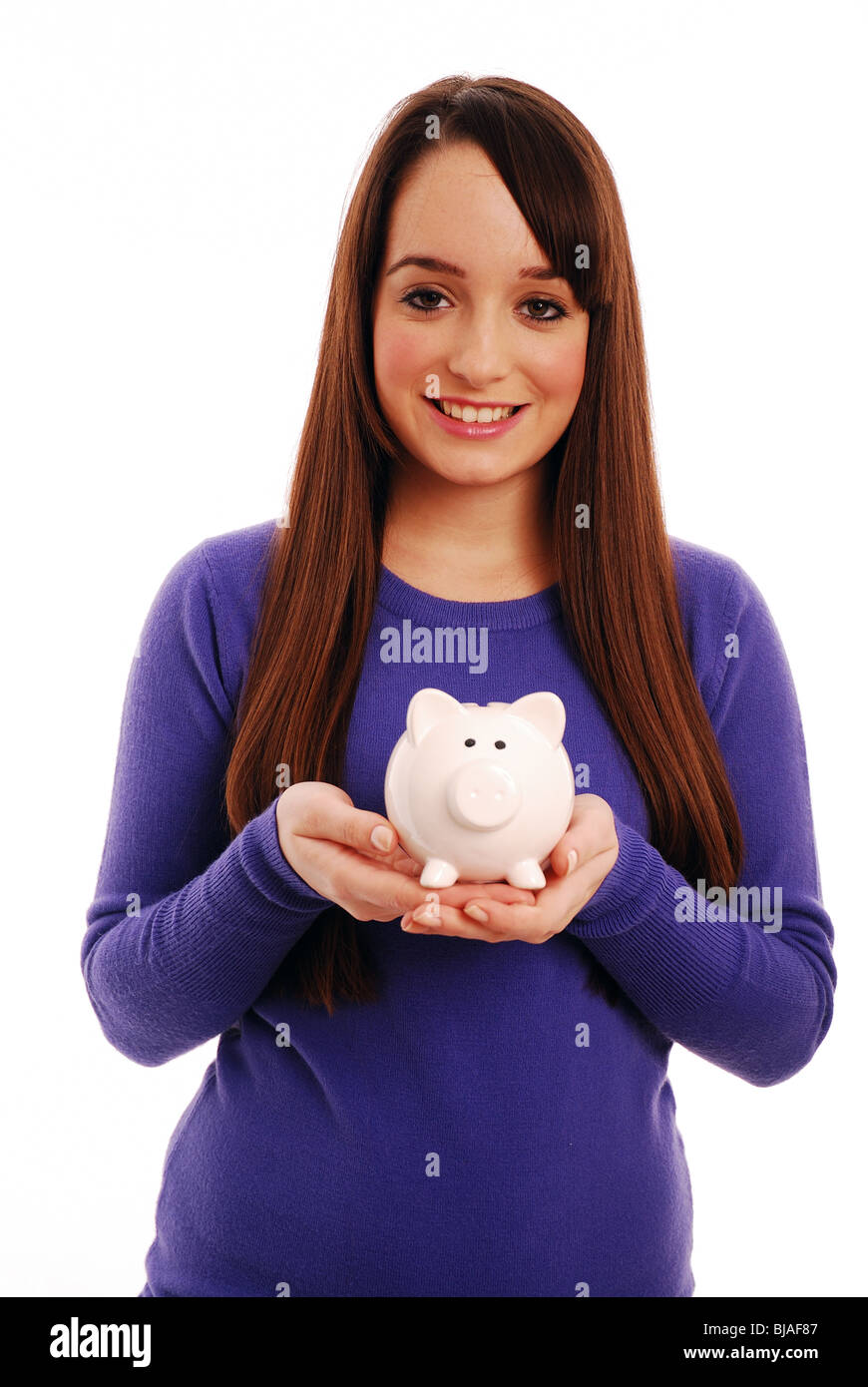 Young girl holding a piggy bank Stock Photo