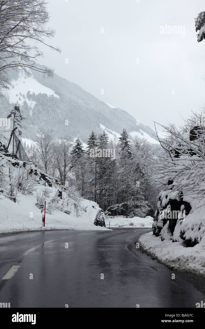 Cleared road in the snow, near Interlaken, Switzerland Stock Photo Alamy