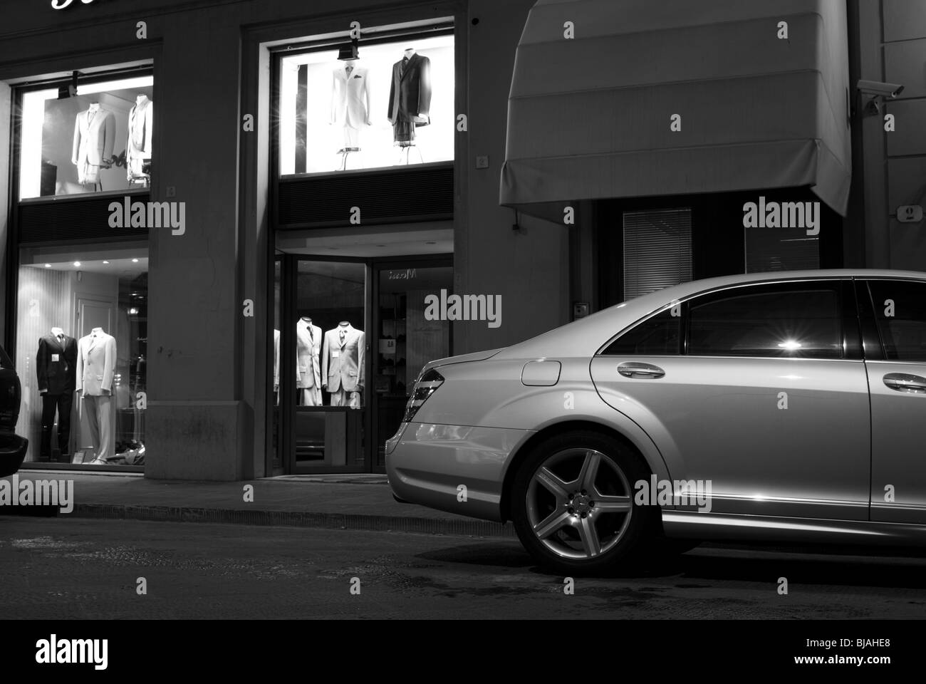 A Mercedes parked in a street in Florence Stock Photo