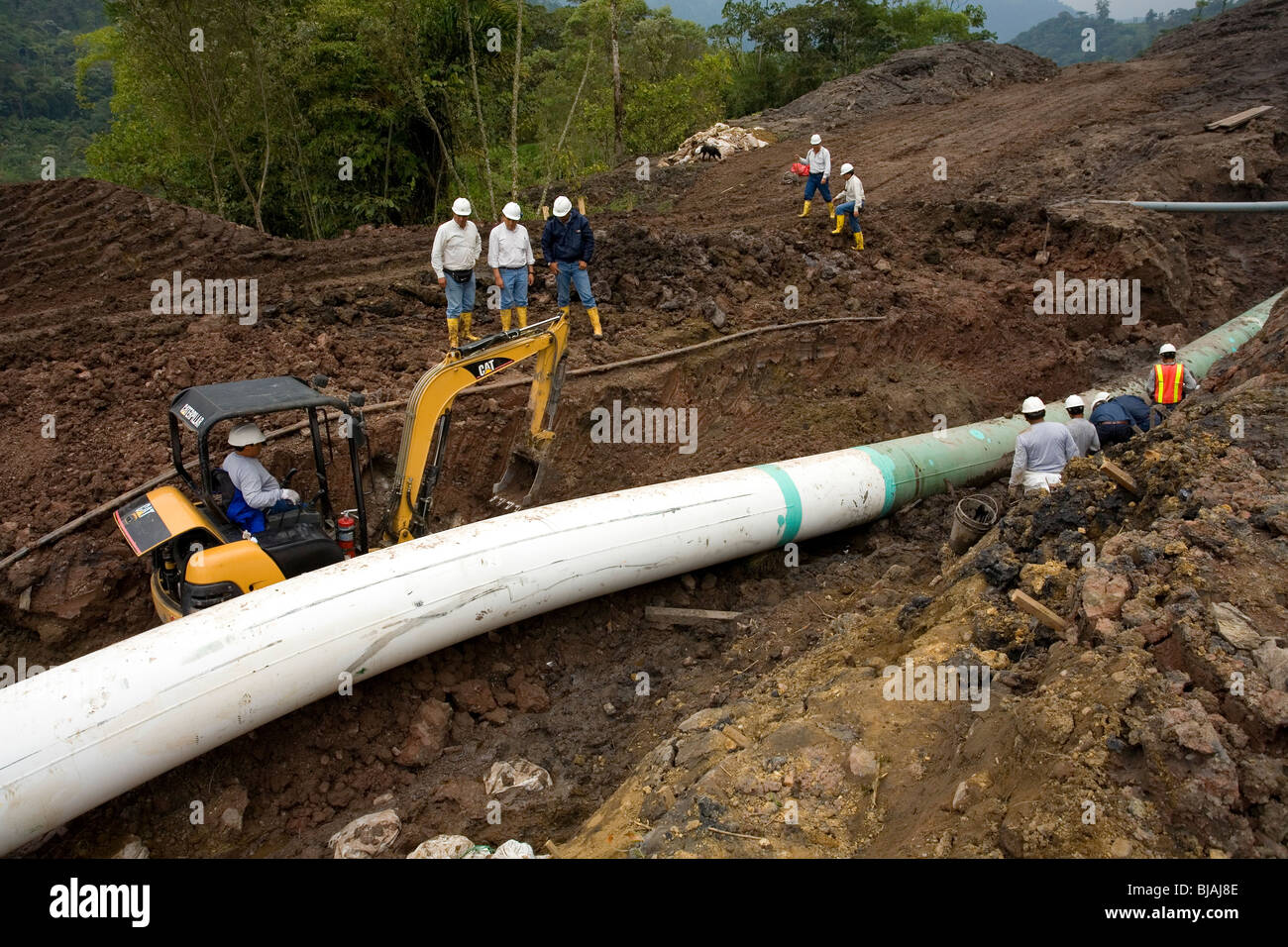 Repairing an oil pipeline in the Ecuadorian Amazon Stock Photo