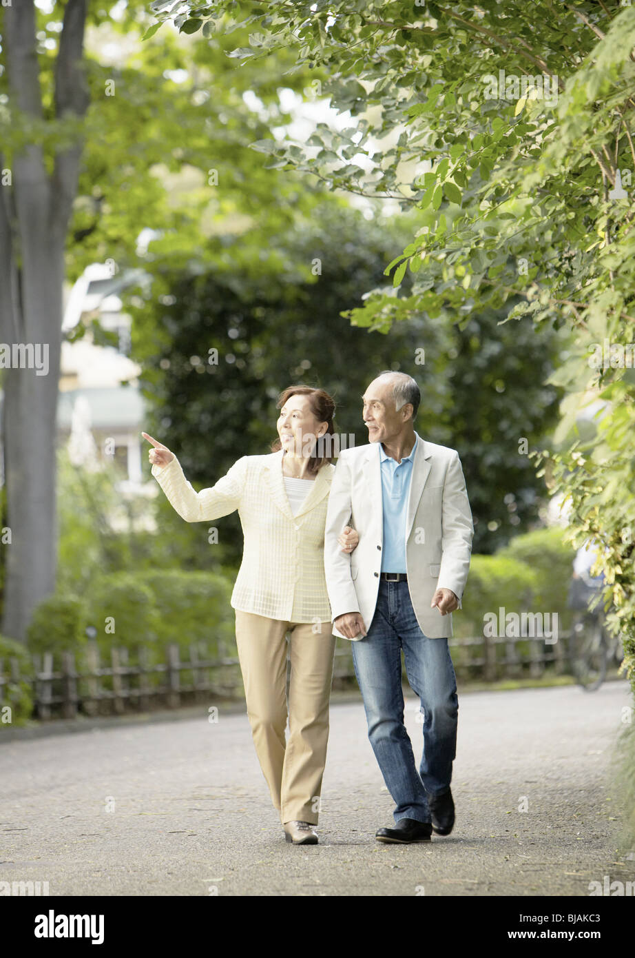 Senior couple walking around Stock Photo - Alamy