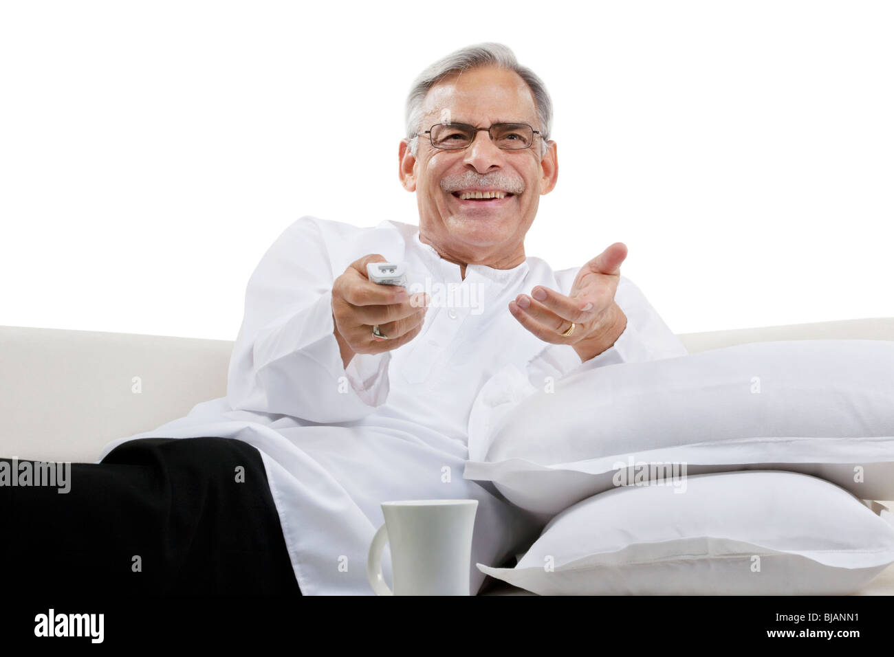 Old man watching television Stock Photo Alamy