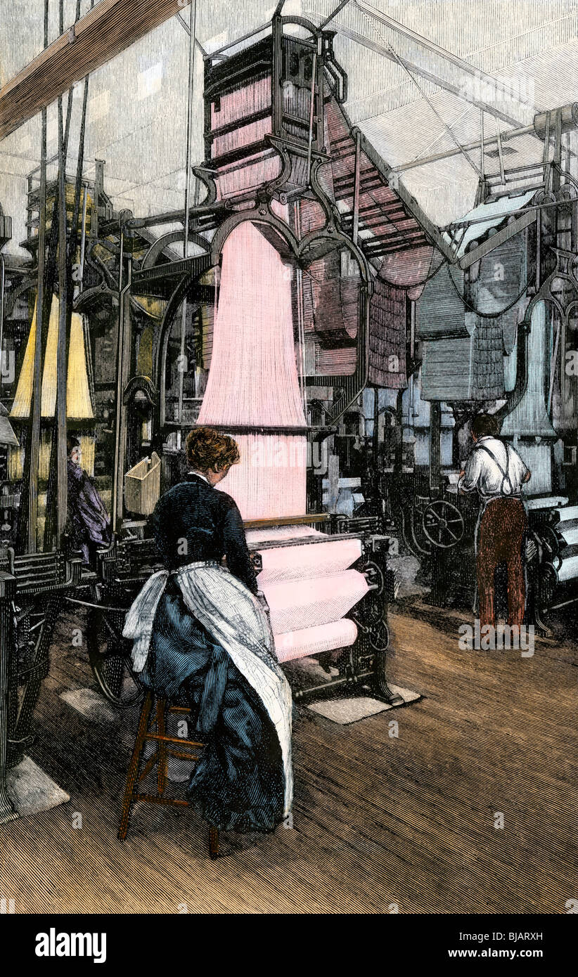 Woman worker using a mechanized Jacquard loom, 1880s. Hand-colored woodcut Stock Photo