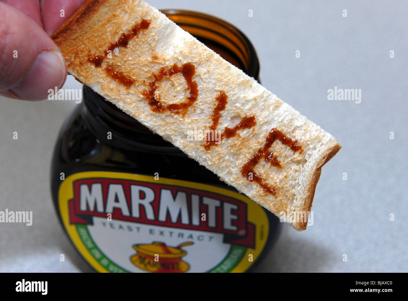 Generic image of Marmite with Love and Hate written on toast. A Unilever  Brand guaranteed to cause arguments Stock Photo - Alamy