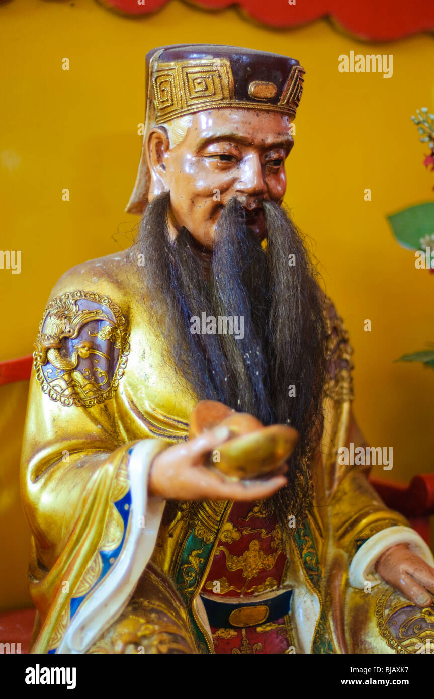 Taoist statue inside a Tao temple Stock Photo