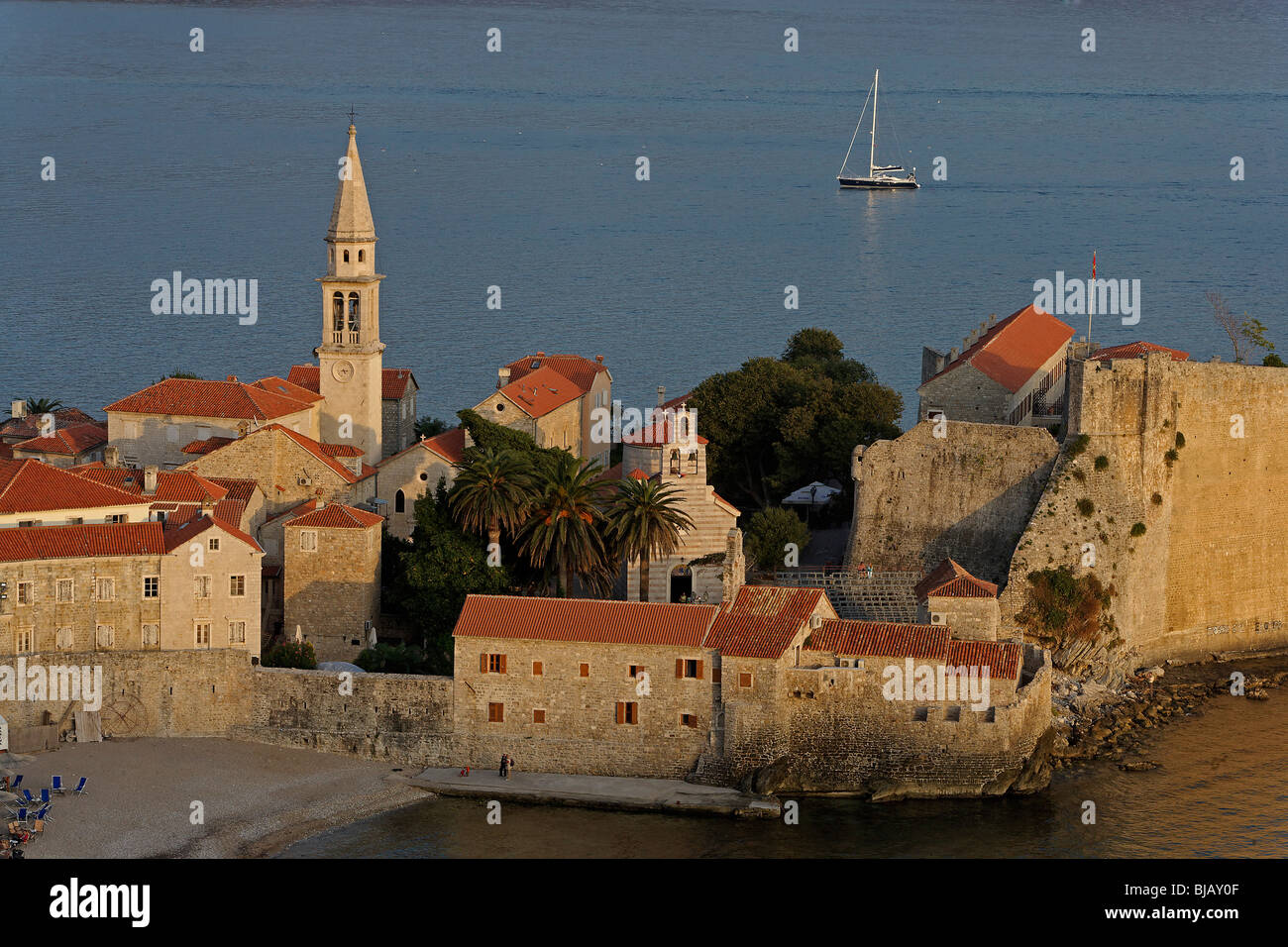 Budva,old town peninsula,Cathedral of St John,Bell tower,fortification walls,Adriatic coast,Montenegro Stock Photo