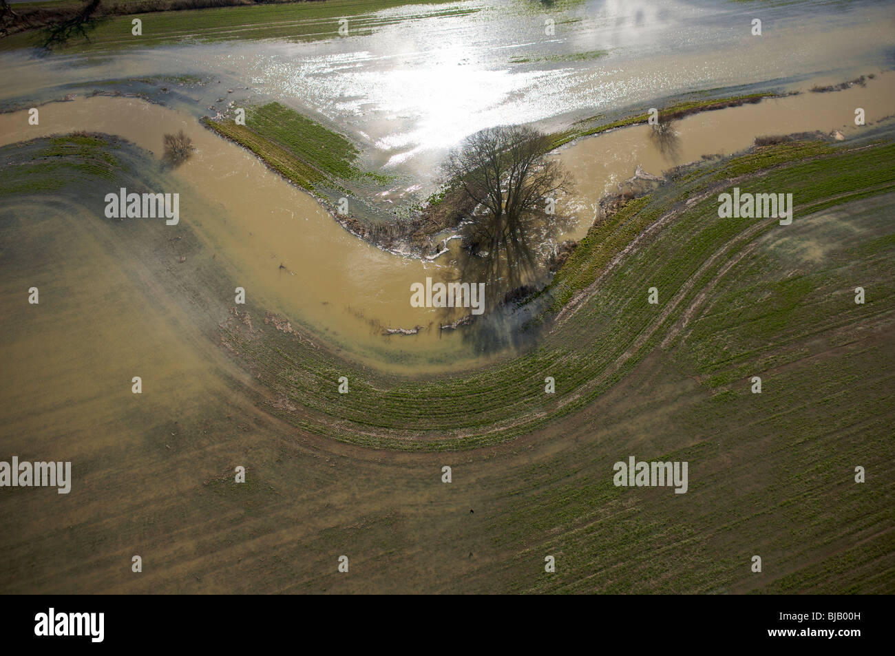 Aerial view of a river bursting it's banks. Stock Photo