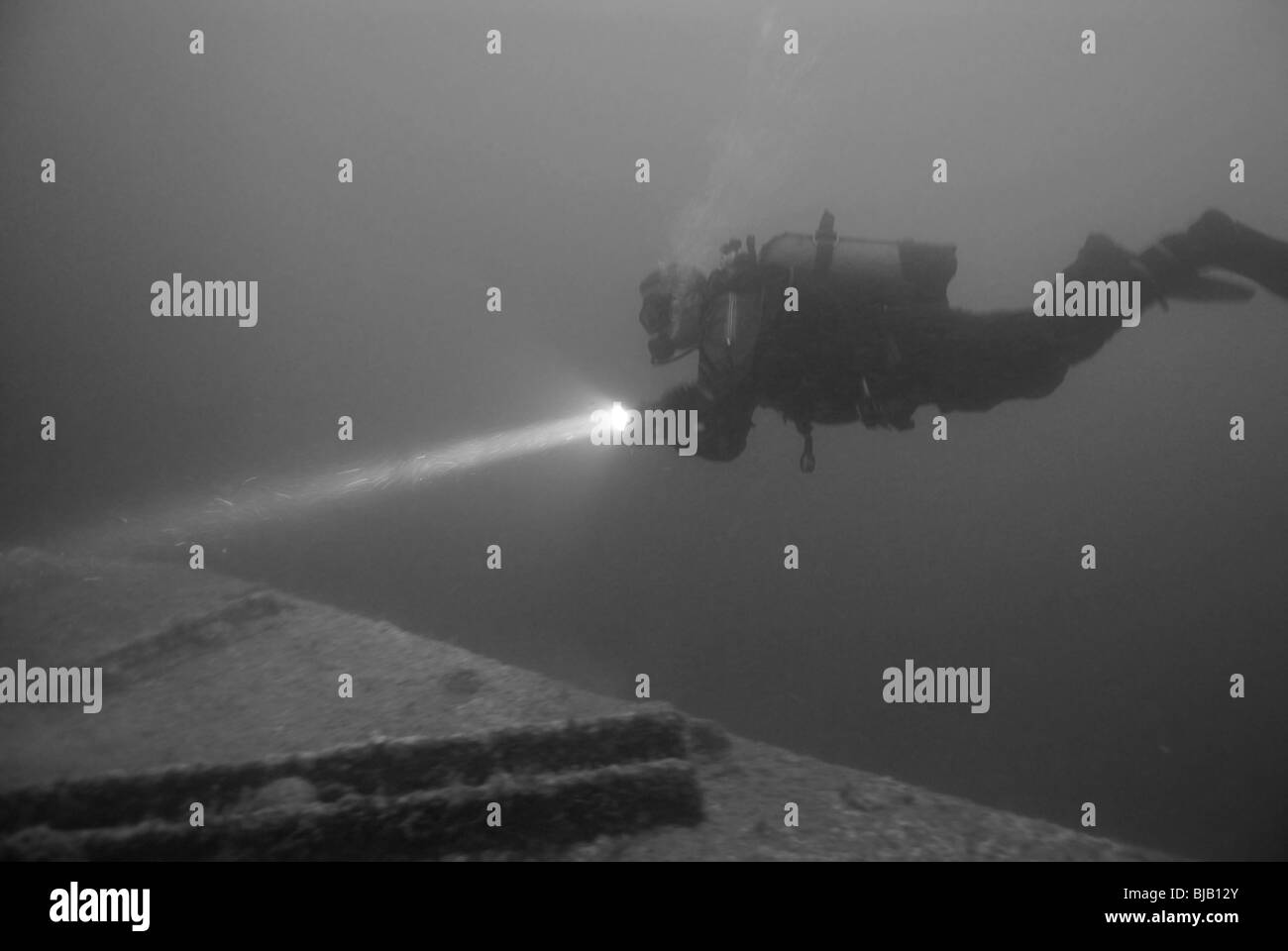 Diver exploring the wreck of US Susan B Anthony in Normandy Stock Photo