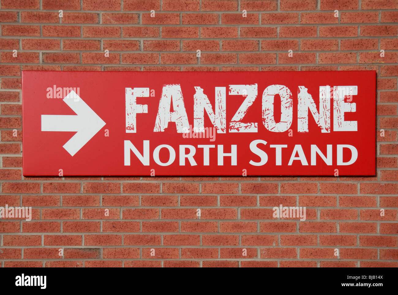FanZone sign on the side of a Old Trafford football stadium, home ground of Manchester United. Stock Photo