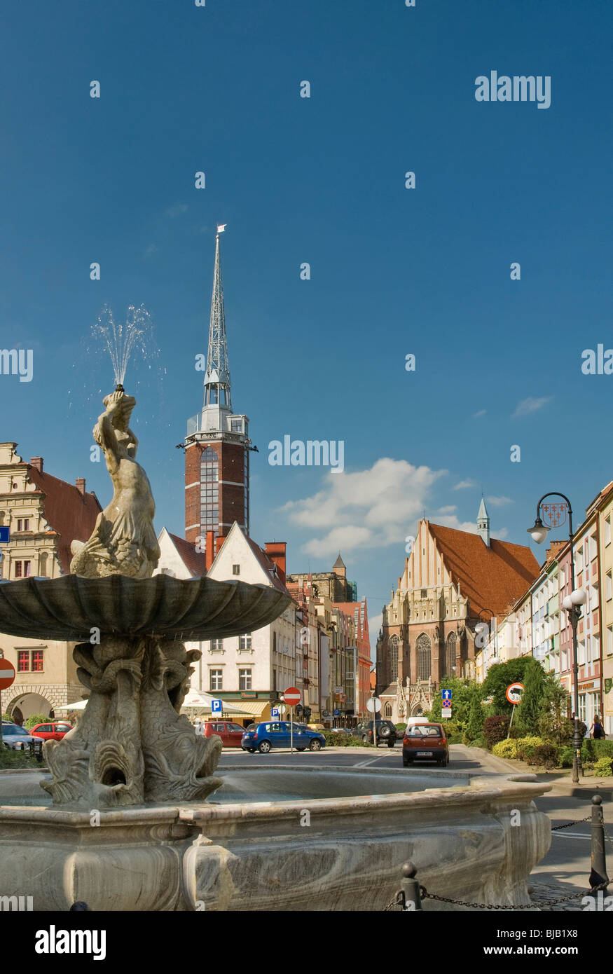 Triton Fountain and tower of New Town Hall at Rynek (Market Square) in Nysa, Opolskie, Poland Stock Photo