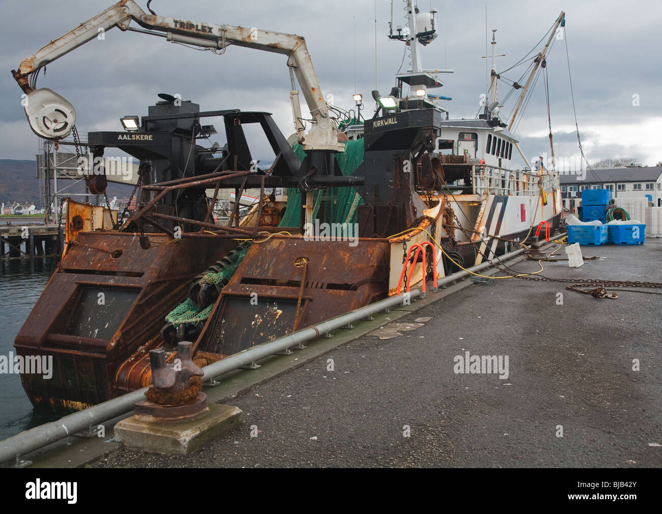 Fishing trawler moored at Ullapool harbour Stock Photo