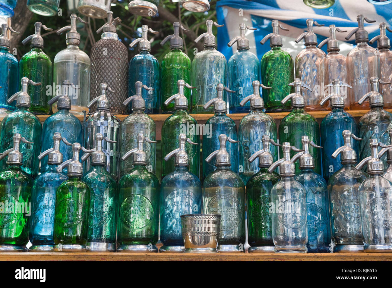 Old fashioned siphon bottles at market stall in San Telmo, Buenos Aires, Argentina Stock Photo
