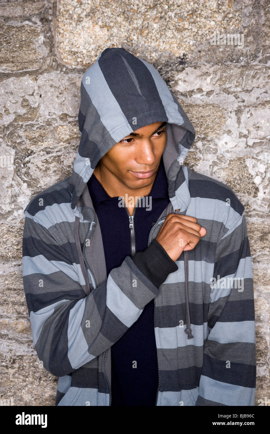 Handsome stylish young African-American man wearing hoodie Stock Photo -  Alamy
