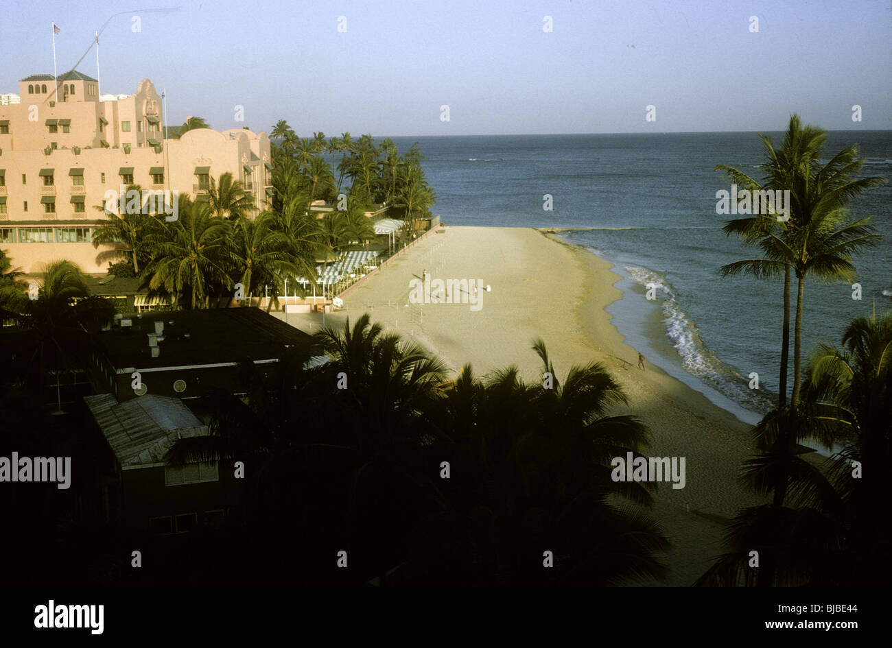 Waikiki Hawaii beach 1964 1960s color horizontal travel hotel pacific ocean palm trees Stock Photo