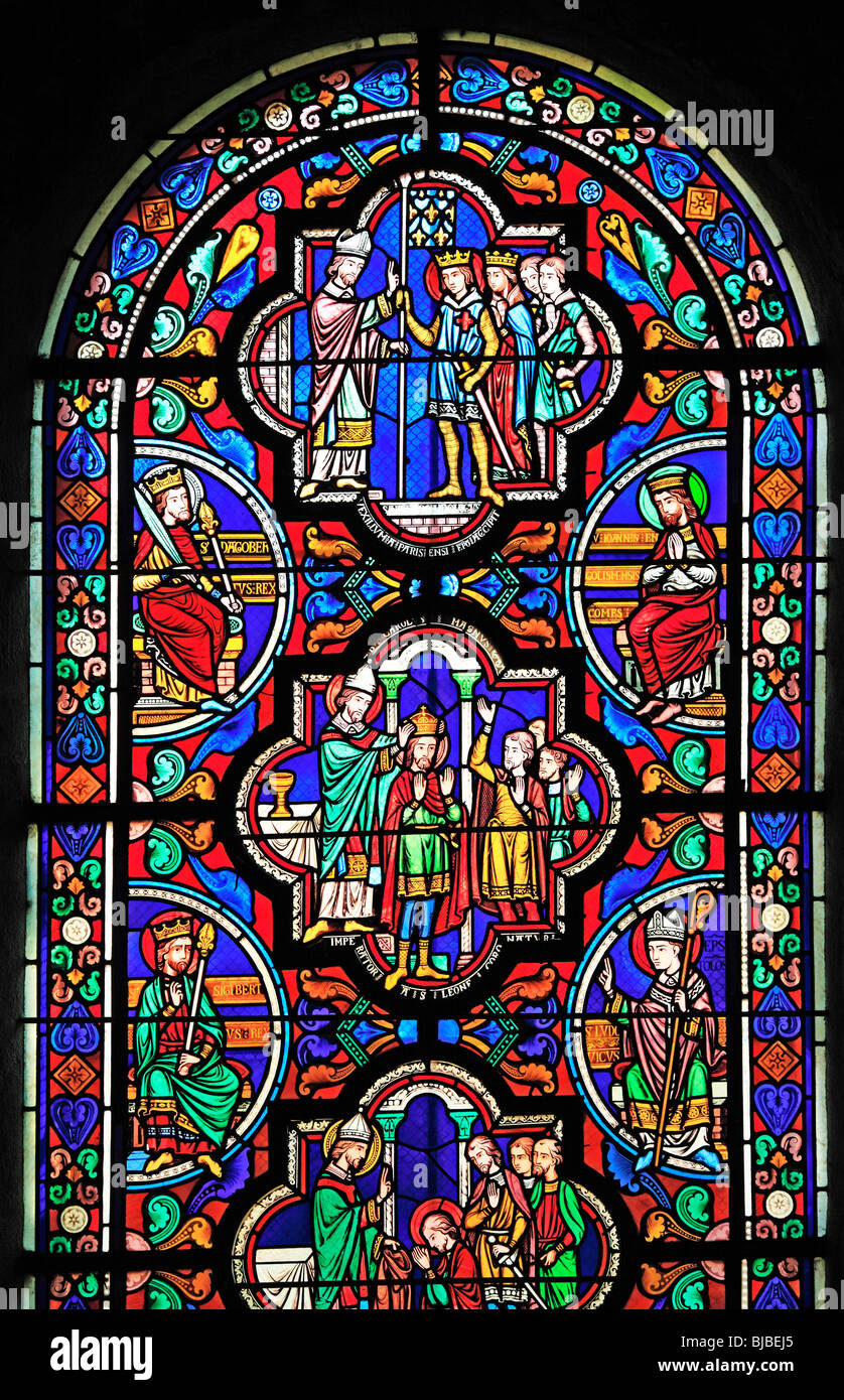 Romanesque coloured stained window, Glass painting in the church Sainte