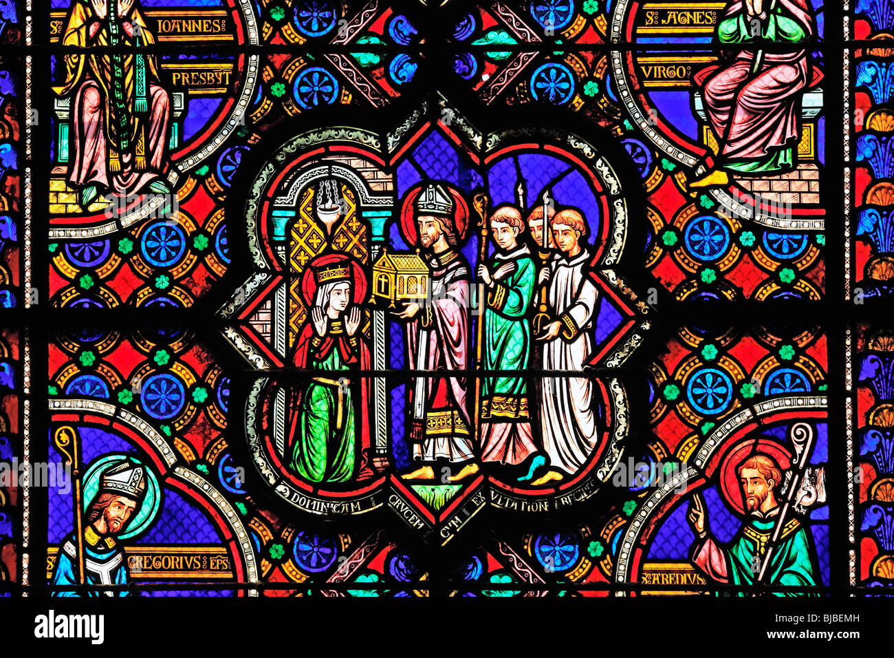 Romanesque coloured stained window, Glass painting in the church Sainte