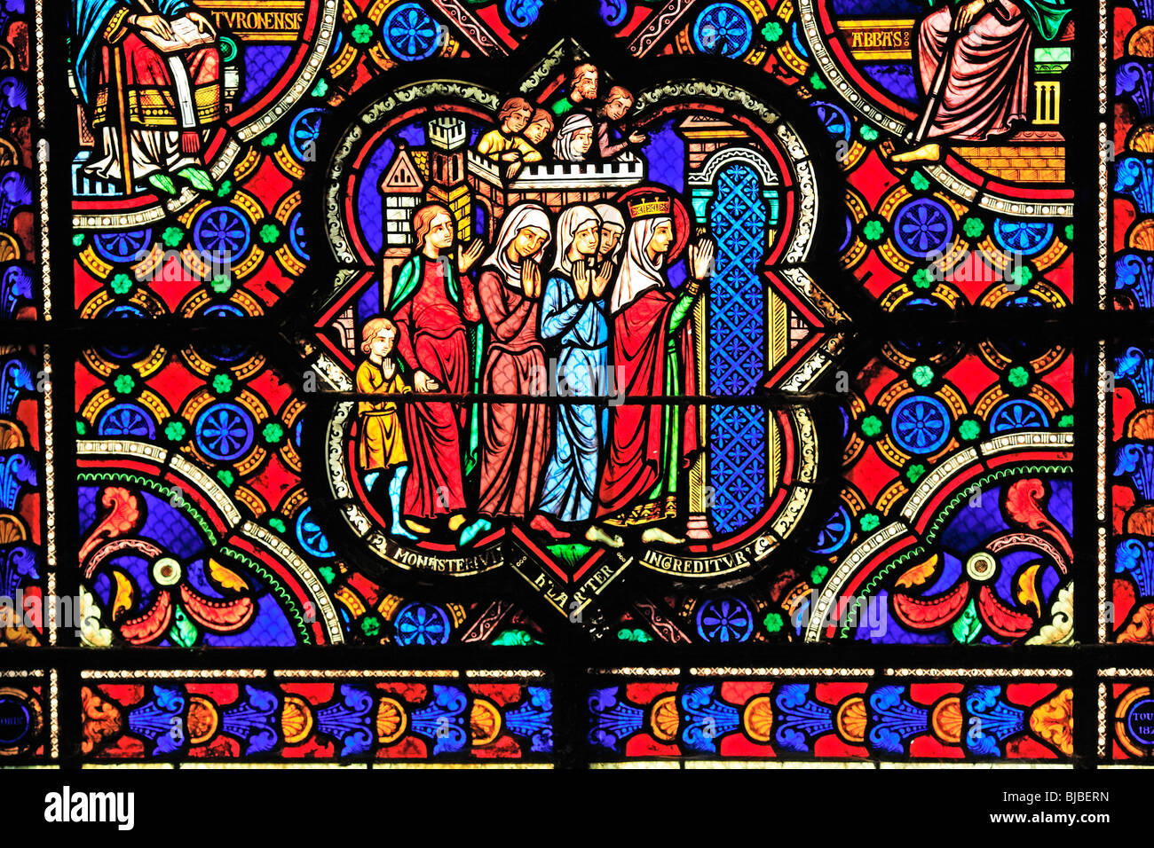Romanesque coloured stained window, Glass painting in the church Sainte
