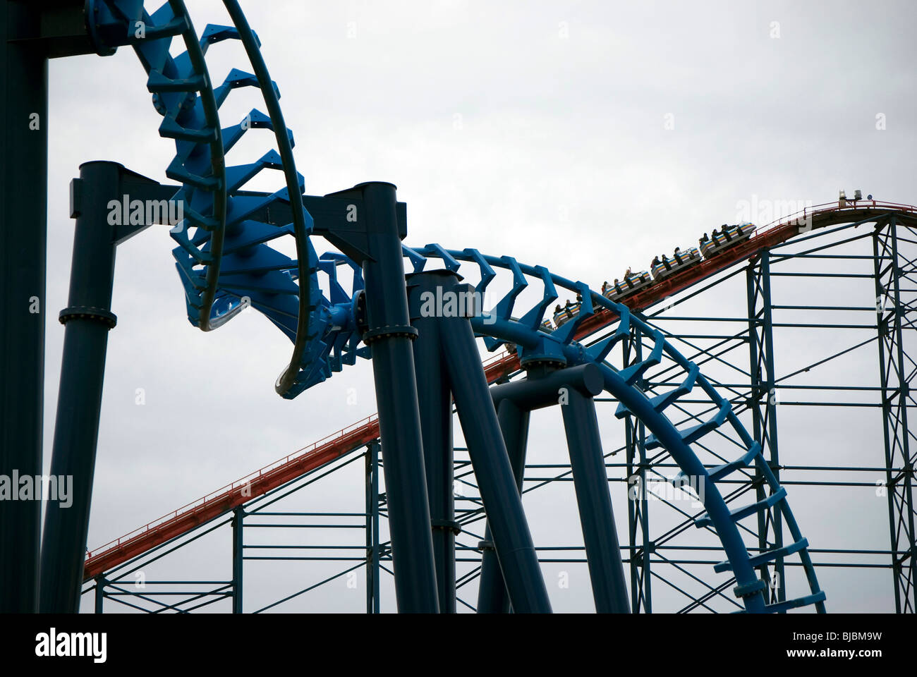 Part of the Infusion ride with the Pepsi Max Big One rollercoaster the  background, Blackpool Pleasure Beach, England Stock Photo - Alamy