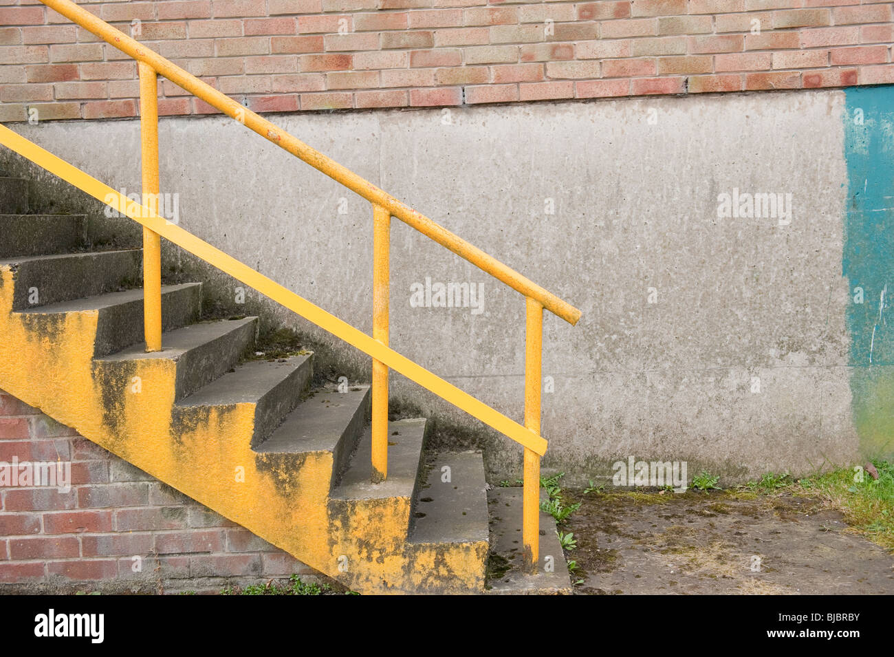 Yellow concrete steps and hand rail fine art Stock Photo