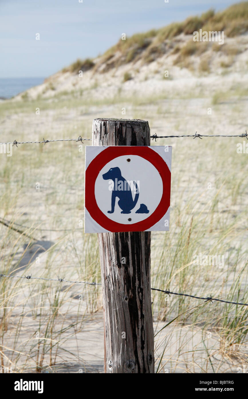 Dog Litter Sign on beach, Texel Island, Holland Stock Photo