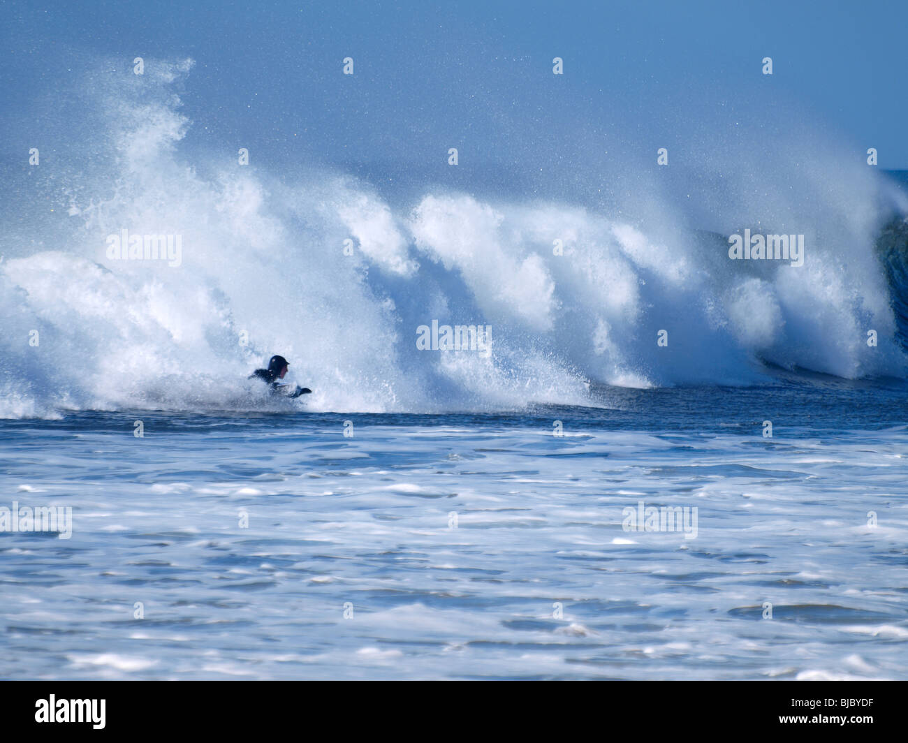 Bodyboarder coming out of a large wave, Cornwall Stock Photo