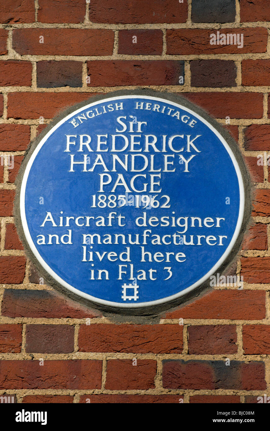 english heritage blue plaque marking a home of aircraft designer sir