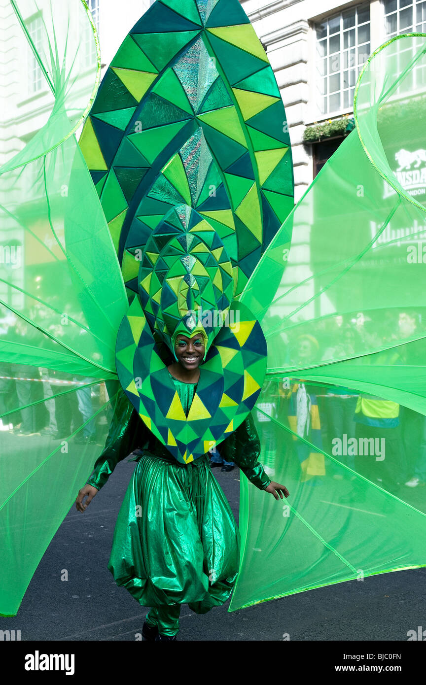 A carnival dancer performing in the St Patricks Day Parade in London ...