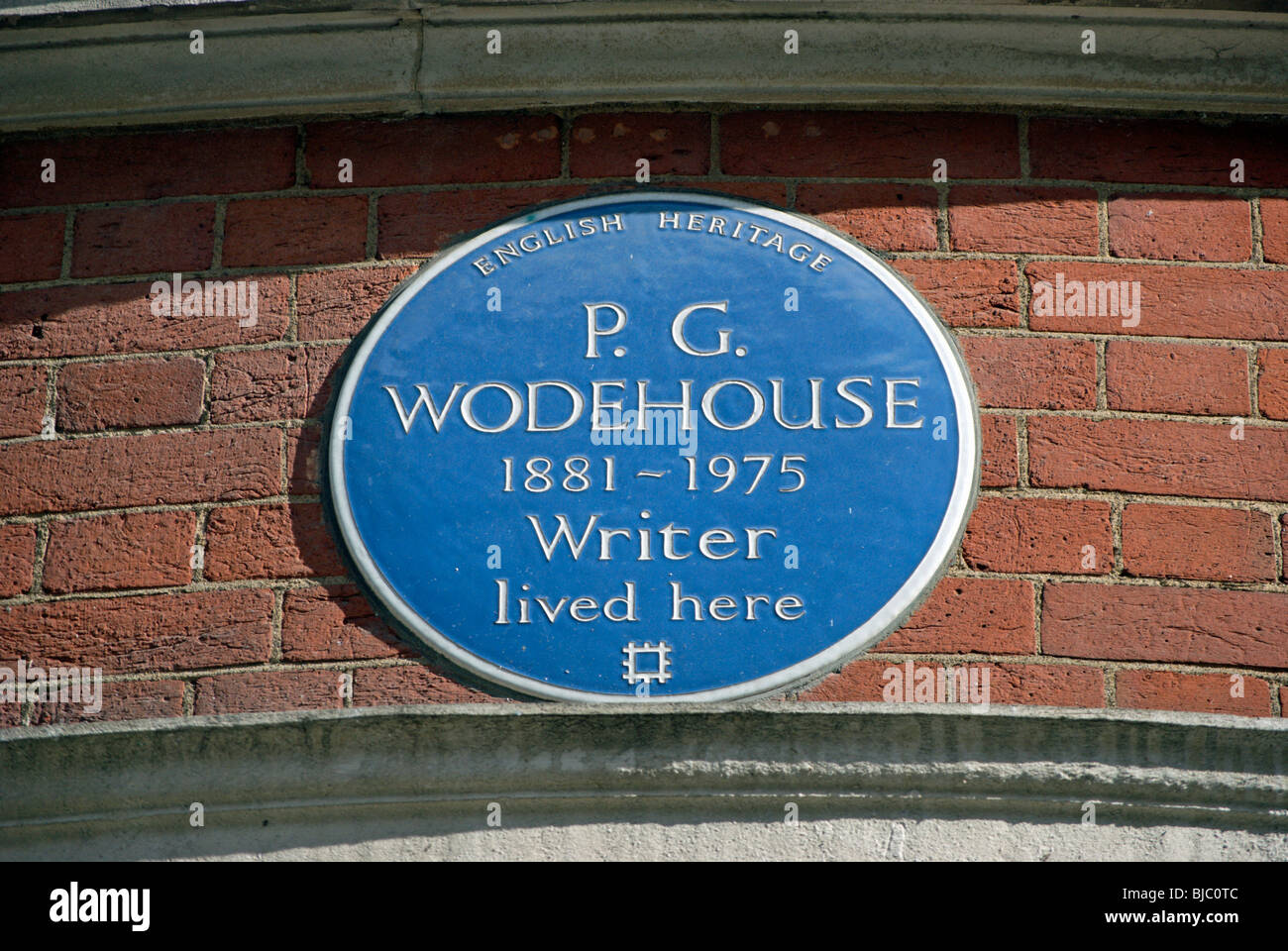 english heritage blue plaque marking a former home of writer pg wodehouse, in mayfair, london, england Stock Photo