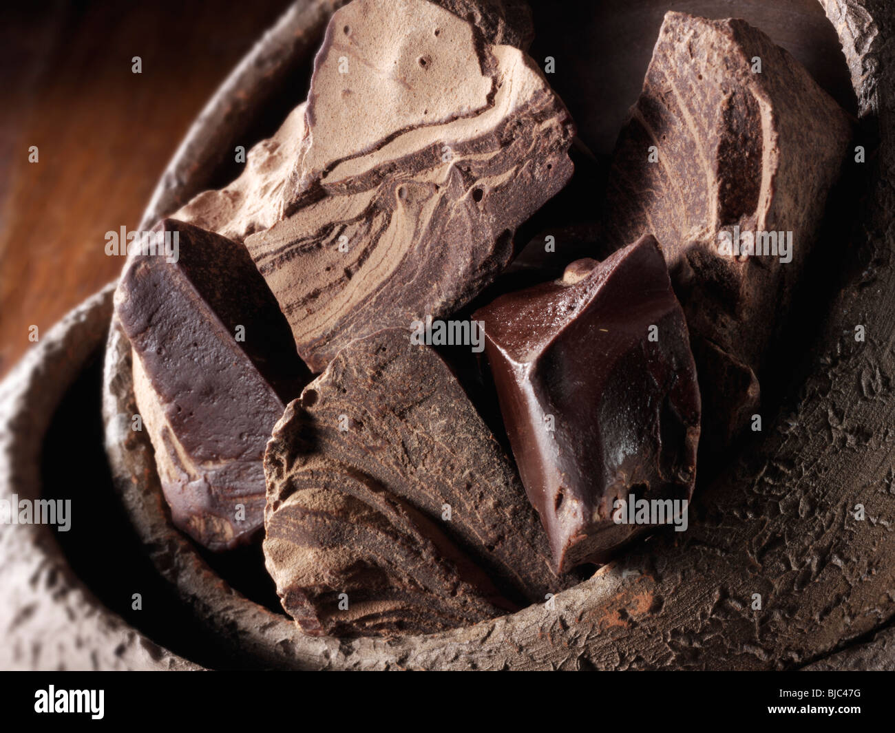 Cacao liquor pieces stock photos Stock Photo