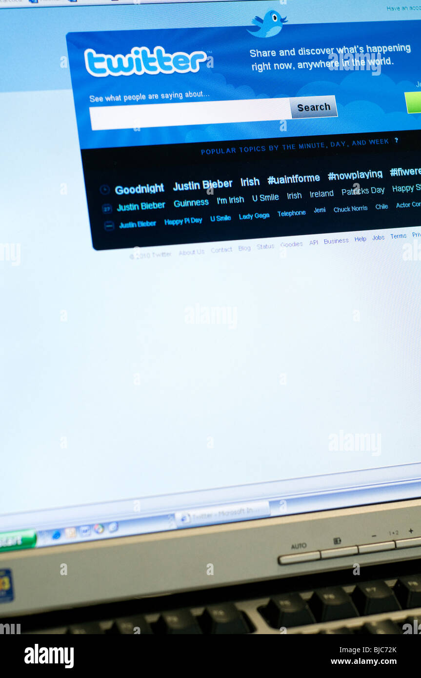 A Closeup Of A Computer Screen Showing The Twitter Homepage And Logo Stock Photo Alamy