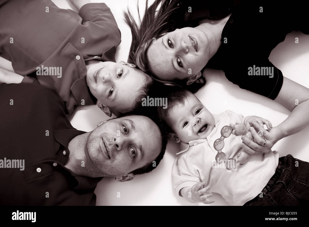 Happy family circle hi-res stock photography and images - Alamy