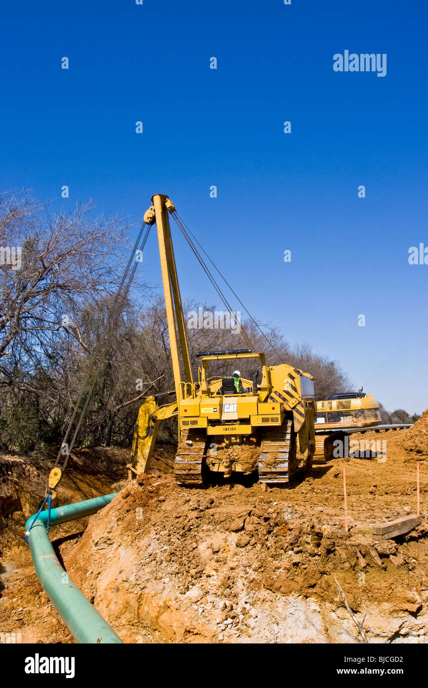 Construction equipment and skilled personnel are required for pipeline construction in northern Texas, U.S.A. Stock Photo