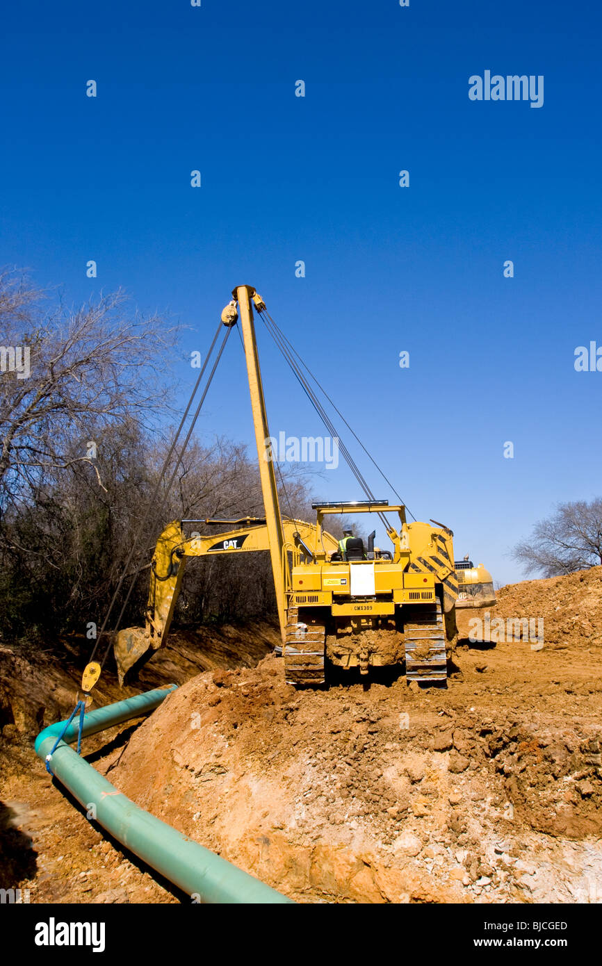 Construction equipment and skilled personnel are required for pipeline construction in northern Texas, U.S.A Stock Photo