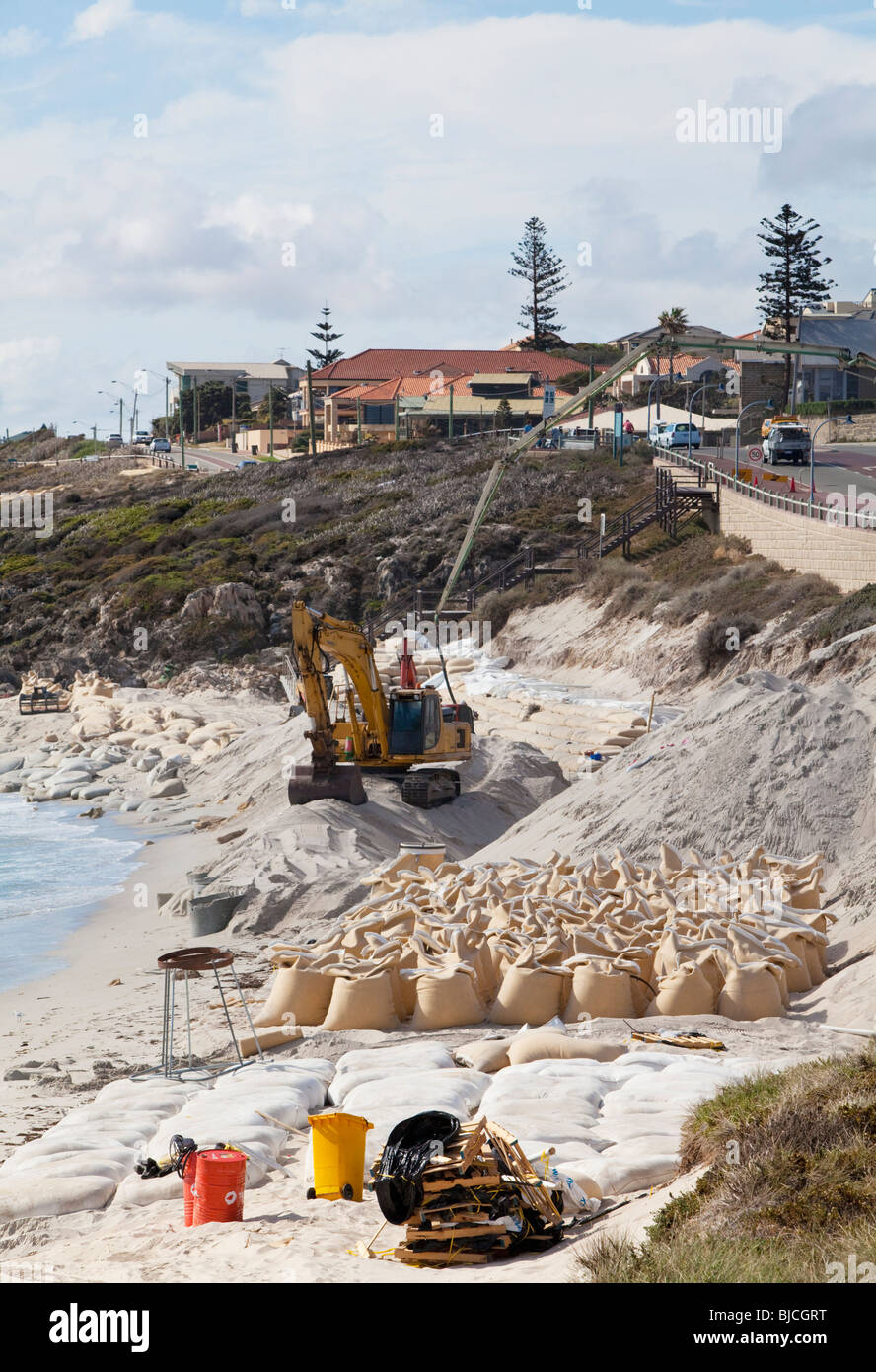 Dozens of 1.5 tonne sandbags used to repair coastline erosion at Waterman's Beach Stock Photo