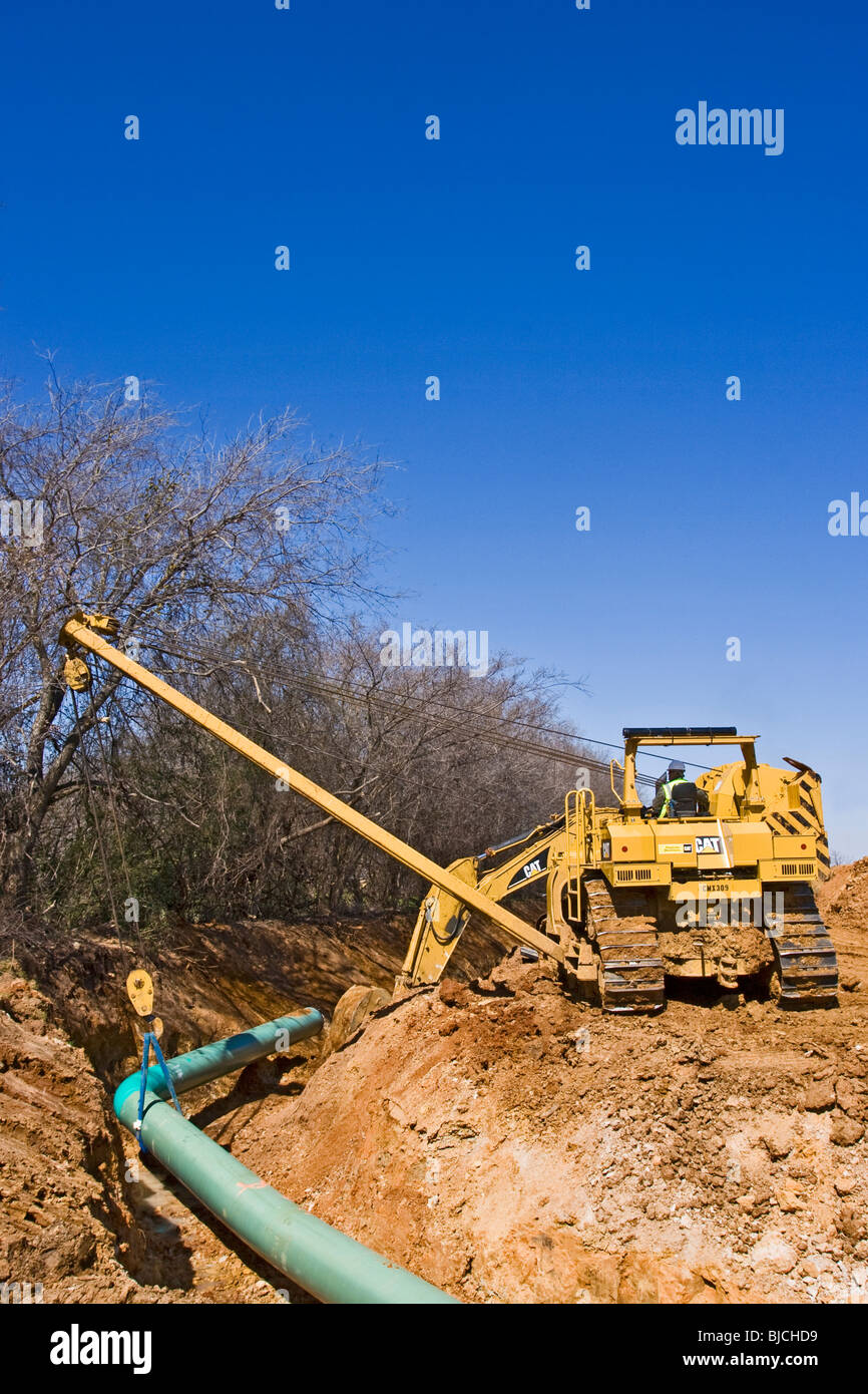 Construction equipment and skilled personnel are required for pipeline construction in northern Texas, U.S.A. Stock Photo