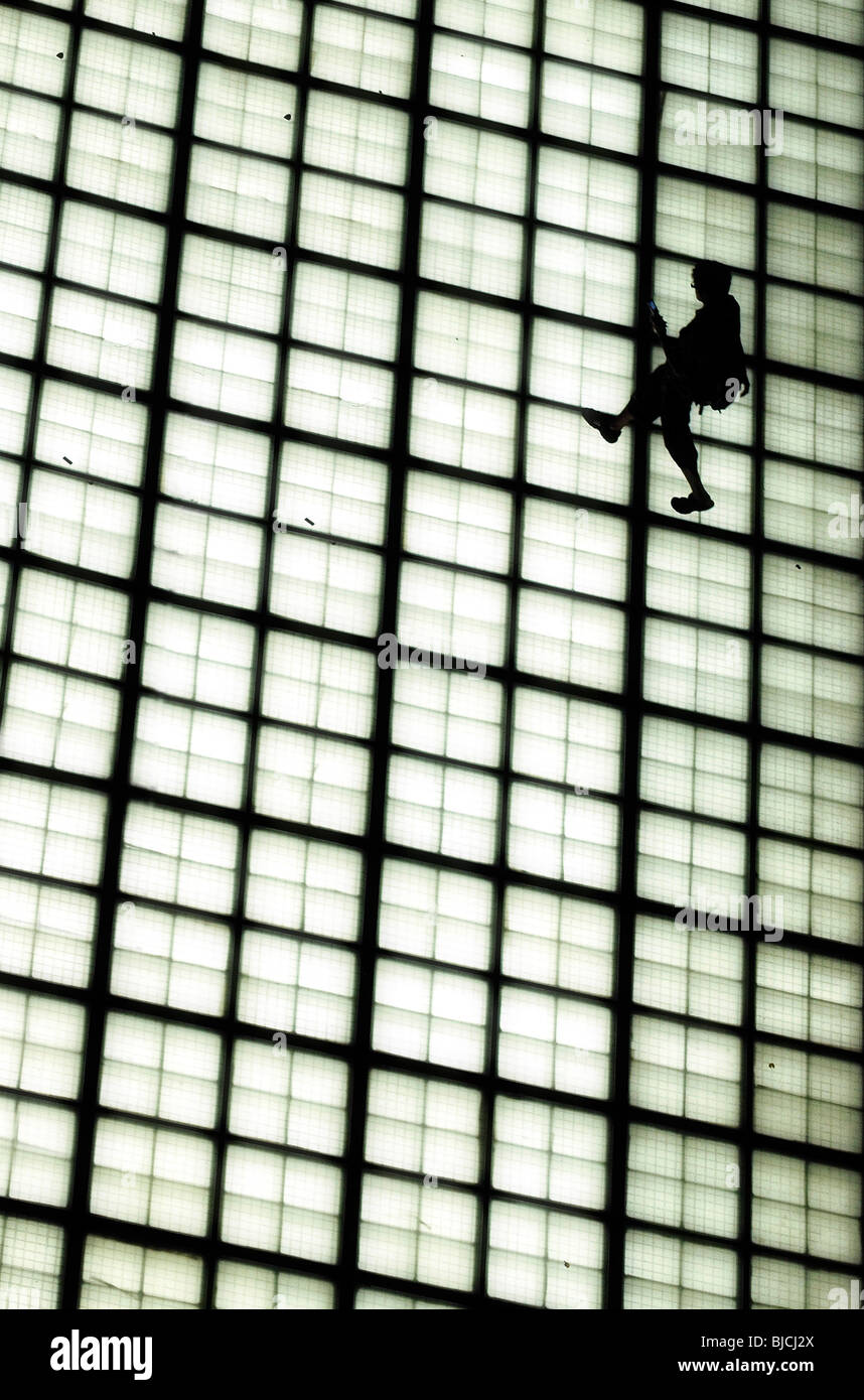 A man walks on an illuminated walkway in Tokyo, Japan Stock Photo - Alamy