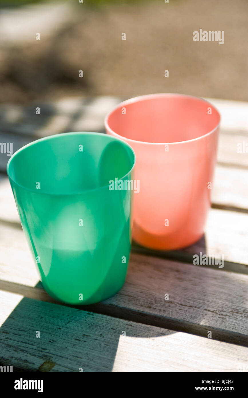 Plastic cups on table Stock Photo