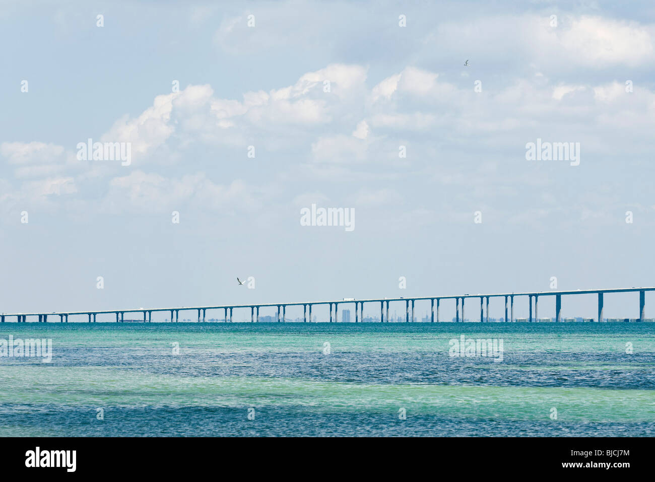 Bridge over ocean Stock Photo - Alamy