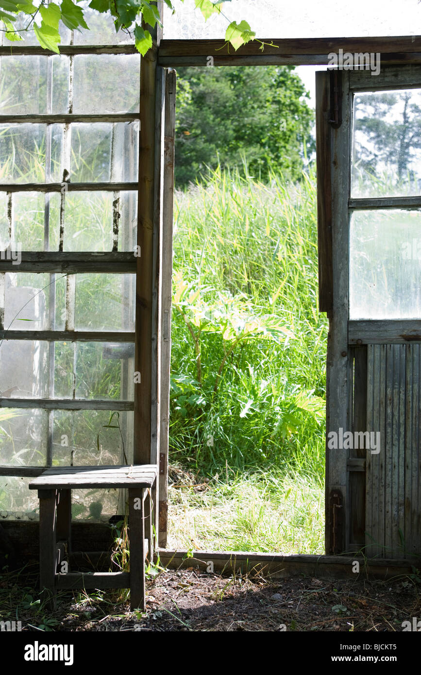 Open door of greenhouse Stock Photo Alamy