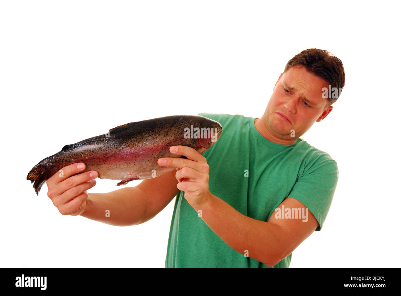 Man holding a large smelly fish Stock Photo