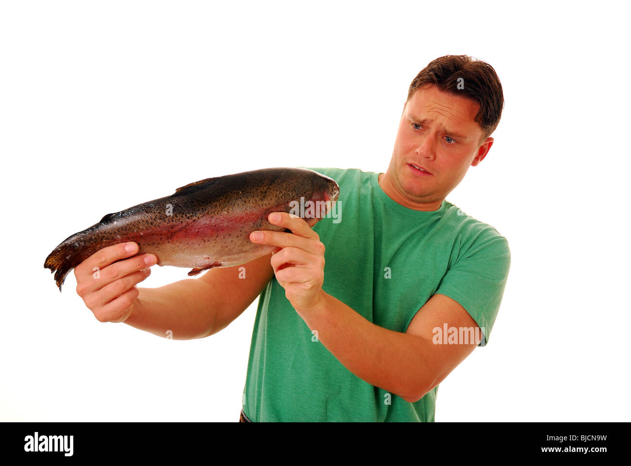 Man holding a large smelly fish Stock Photo